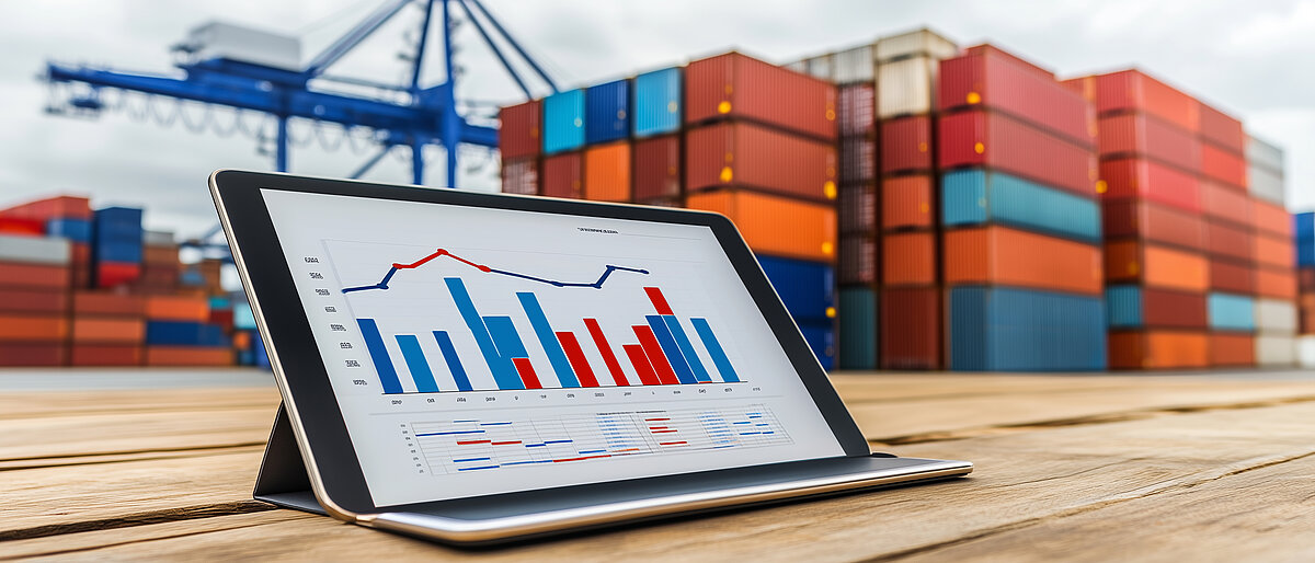 Tablet with Graph in Front of Shipping Containers. Tablet with Graph in Front of Shipping Containers.